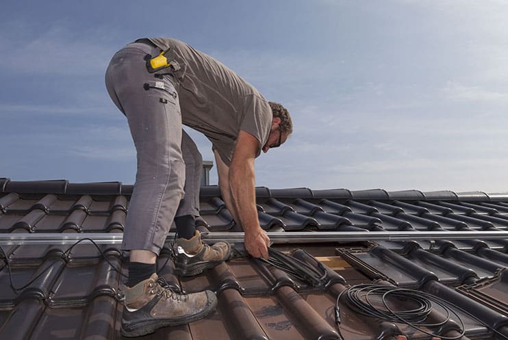 Man Fixing Roof leak - 24/7 Emergency Plumbers in Burleigh Heads, QLD